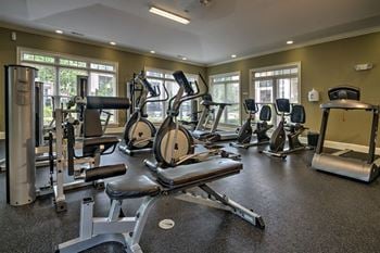 24-hour fitness center at Abberly Woods Apartment Homes by HHHunt, Charlotte, 28216